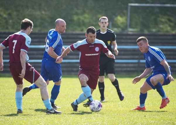 Davie Dickson tries to find a way through the Petershill defence (pic by Craig Halkett)