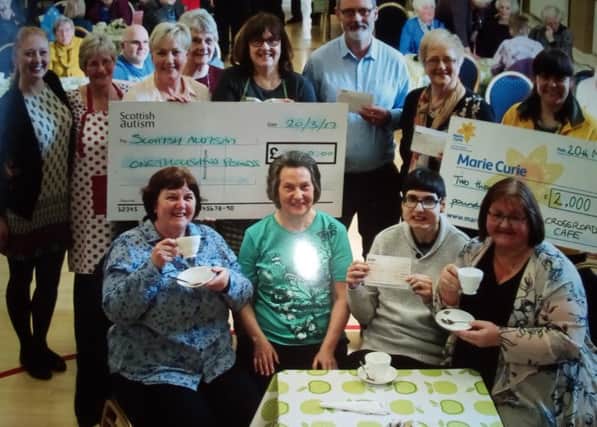 The latest presentation of proceeds from Crossroads Cafe in Kirkton Church