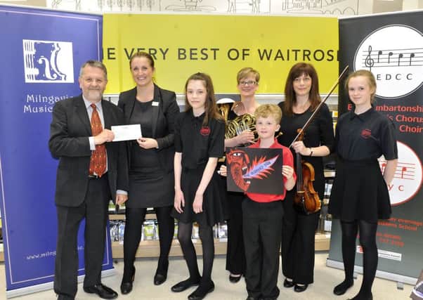 Waitrose cheque presentation to Milngavie Music Club. They received Â£1,000 as successful applicants to their Music Matters scheme.
 Hugh Macdonald - President of MMC, Amy Sharp - Manager, 
Juliet Lynn, Sue Baxdale, Liz Reeves, Euan Kemp and Emily Kemp.