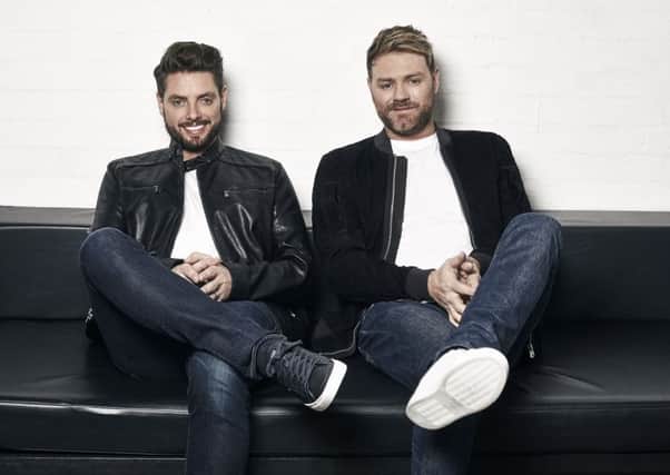 Keith Duffy (left) of Boyzone and Brian McFadden of Westlife have joined forces to form Boyzlife