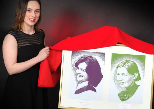 Abby Richards, from Stirling District Tourism, unveils the winners - Mary Slessor and Maggie Keswick Jencks as the first women to be commemorated in the Hall of Heroes gallery at the iconic tourist attraction in Scotland.