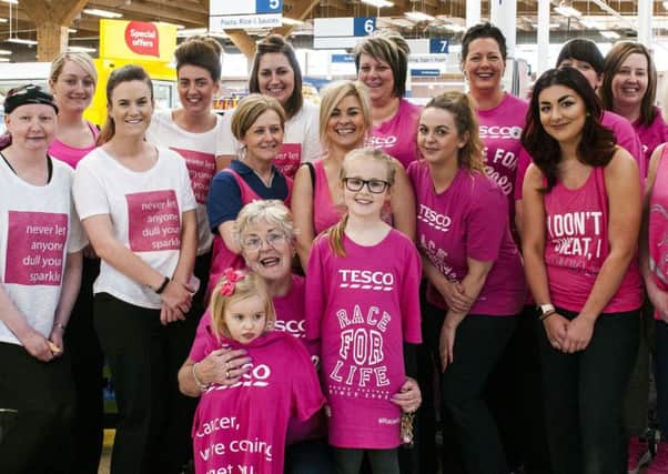 21-04-2017 Ladies from Tesco Store in Carluke who are all taking part in Race for Life. Picture Sarah Peters.