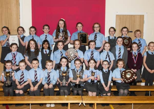 The winning choir and individual winners from St Athanaius.  Picture Sarah Peters.