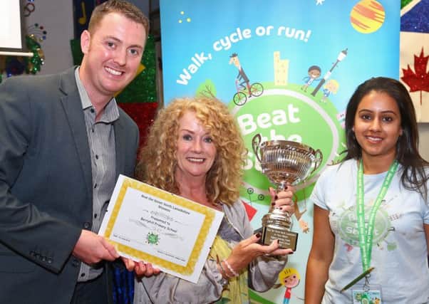 Previous winner Berryhill Primary School in Wishaw receives i's prizes for travelling further than anyone else.