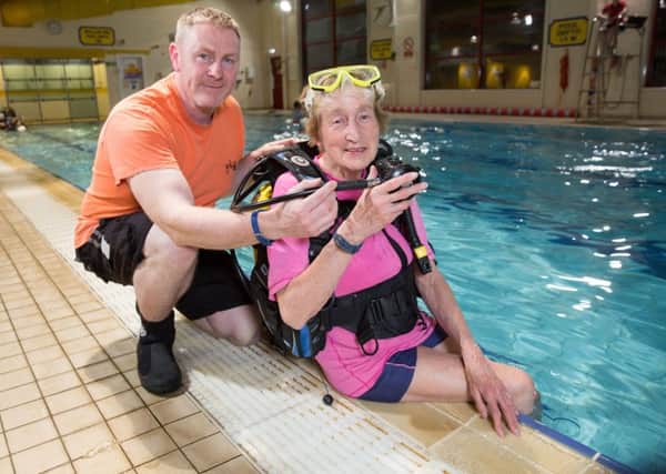 Thistle Divers member Anna Illington who learned to dive after she retired, is 81 now and still diving all over the world. In the pool at Kilsyth Leisure centre with Rob Sewell, Diving Officer at Thistle Divers.
Picture Robert Perry 24th April 2017
Must credit photo to Robert Perry
www.robertperry.co.uk
NB -This image is not to be distributed without the prior consent of the copyright holder.
in using this image you agree to abide by terms and conditions as stated in this caption.
All monies payable to Robert Perry
(PLEASE DO NOT REMOVE THIS CAPTION)
This image is intended for Editorial use (e.g. news). Any commercial or promotional use requires additional clearance.
Copyright 2016 All rights protected.
first use only
contact details
Robert Perry
07702 631 477
robertperryphotos@gmail.com
Robert Perry reserves the right to pursue unauthorised use of this image . If you violate my intellectual property you may be liable for damages, loss of income, and profits you derive from the use of this