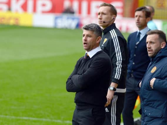Stephen Robinson and his assistant James McFadden survey Saturday's home defeat to Dundee (Pic by Alan Watson)