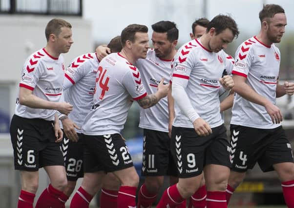 Clyde celebrate their goal against Berwick - they need another point at Montrose on Saturday.