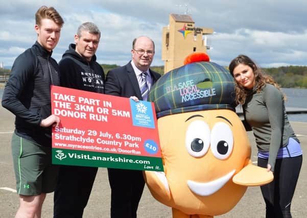 Chairman of the Lanarkshire Tourism Partnership, Mark Calpin (third from the left) with Haggi (the games mascot) at the launch