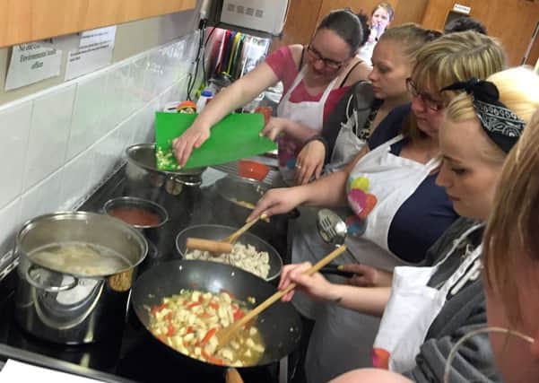 Learning to cook for the family is just one service Healthy Valleys offers