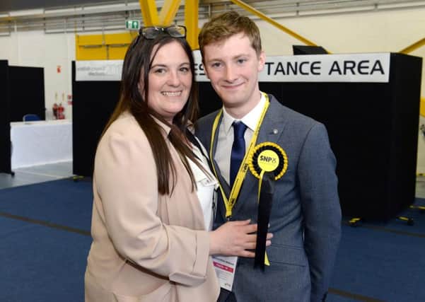 Murdostoun councillor Cameron McManus celebrates his election with mum Nicky