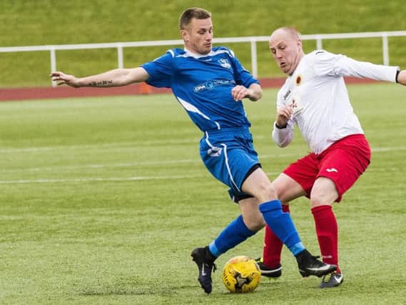 Rovers goalscorer Ian Watt battles for possession (Pic by Sarah Peters)