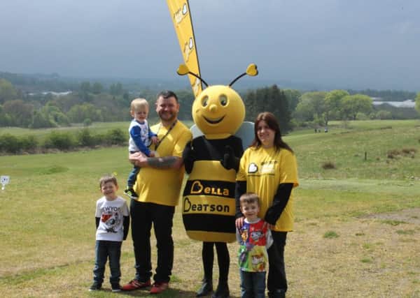 Paul Sheerin with his family and Bella the Beatson Bee