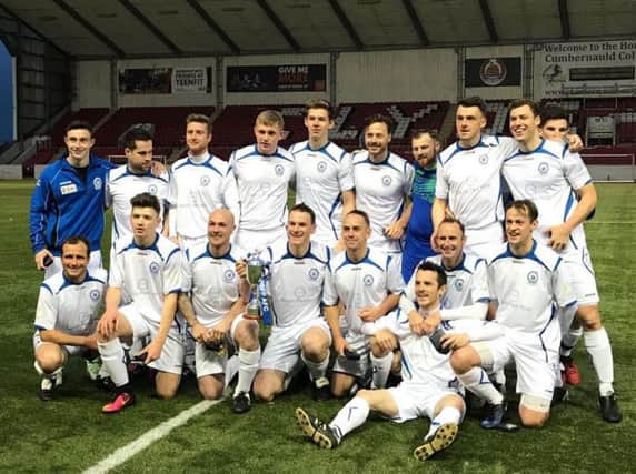 Dalziel FP AFC players celebrate winning the Wullie Turner Challenge Cup to add to their success in this seasons Caledonian League Premier Division