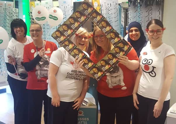 Staff at Specsavers in Motherwell give their backing to Comic Relief