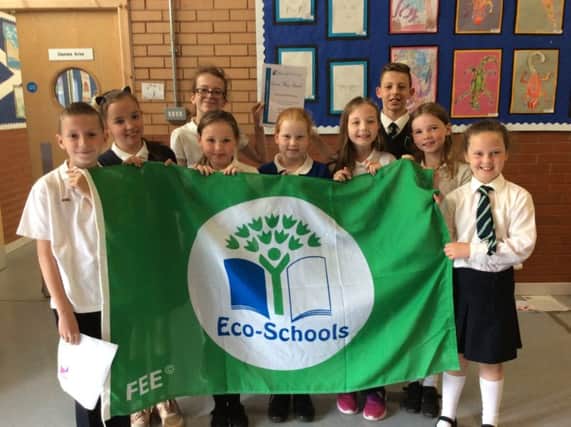 Pupils with their latest green flag