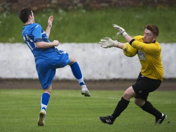 Irvine keeper George Scott denies Nicky Prentice, but Rangers got the win they needed.