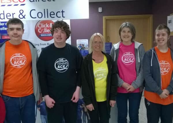 Tennis Aces pictured at their first bag pack at Tesco, Kirkintilloch