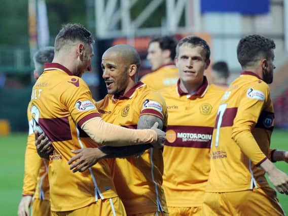 Lionel Ainsworth (2nd left) celebrates with Louis Moult and Stevie Hammell after scoring what proved to be his final goal for Motherwell, a stunning free-kick in the recent 3-1 home Scottish Premiership victory over Kilmarnock (Pic by Alan Watson)