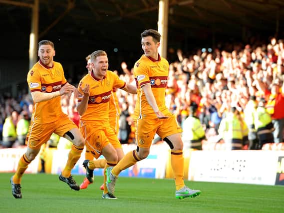 Carl McHugh celebrates scoring the opening goal in Motherwell's recent 3-1 home victory over Kilmarnock (Pic by Alan Watson)