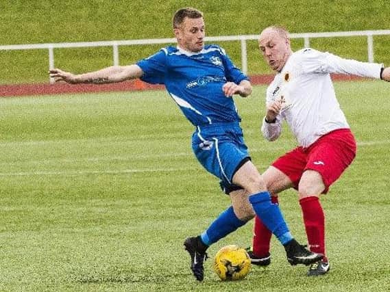 Ian Watt (in action against Rossvale last season) has agreed to stay with Carluke Rovers for another season (Pic by Sarah Peters)