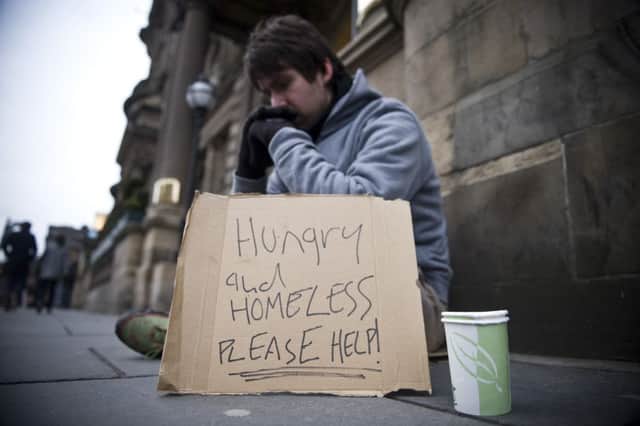 Ian Georgeson
07921 567360
Reporter Mark McLaughlin spends some time on the streets to experience life as a homeless person. Begging Begger 
Pic: outside Balmoral