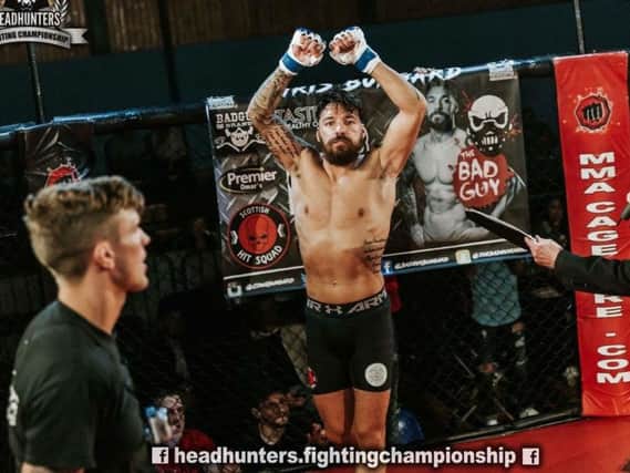 Chris Bungard celebrates his latest MMA victory (Submitted pic)