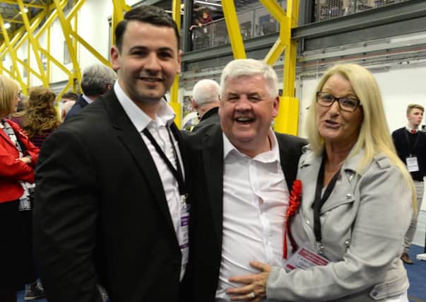 Hugh Gaffney celebrates with his wife, Anne, and election agent, Scott Lamond