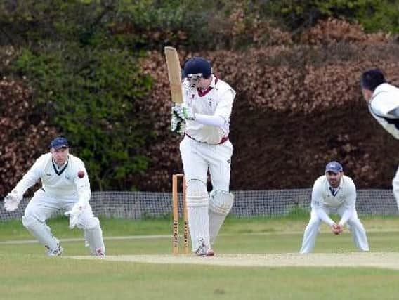 Uddingston wicket-keeper Bryan Clarke attempting to take a catch during previous a league game against this Saturdays opponents Dumfries