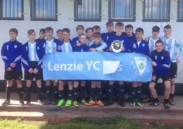 Lenzie YC under-16s (2001s) with their trophy at the Lenzie Youth Club Festival
