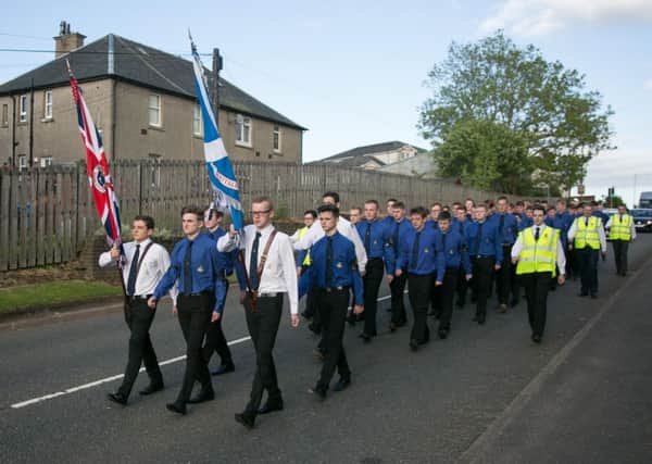 The 71 Queens men of Lanarkshire on parade through Carluke to the church.