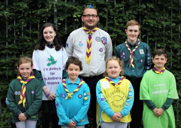 Ziggy's Challenge - Scout leader William Craw  with young supporters.