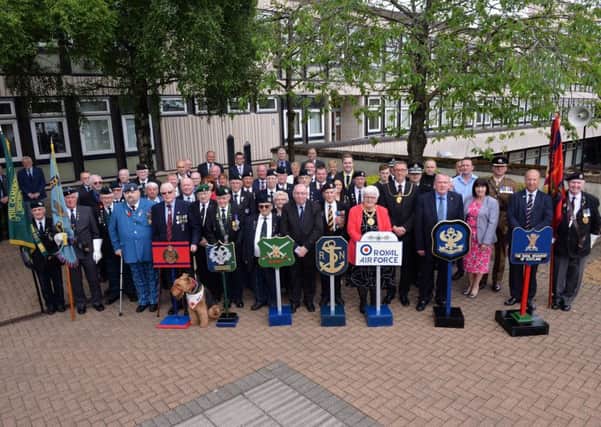 North Lanarkshire provost Jean Jones is joined by representaives from many different branches of the military