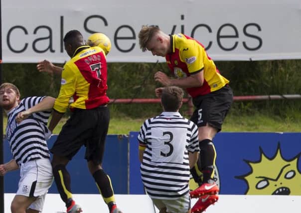 Liam Lindsay in action for Thistle