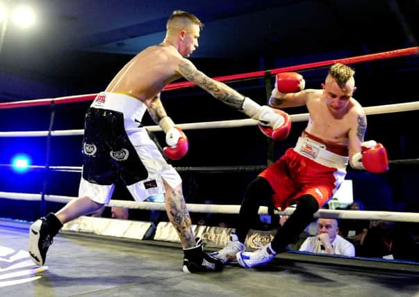 Michael Roberts has Antonio Hortvatic in trouble during their fight last year. (pic by Michael Gillen)