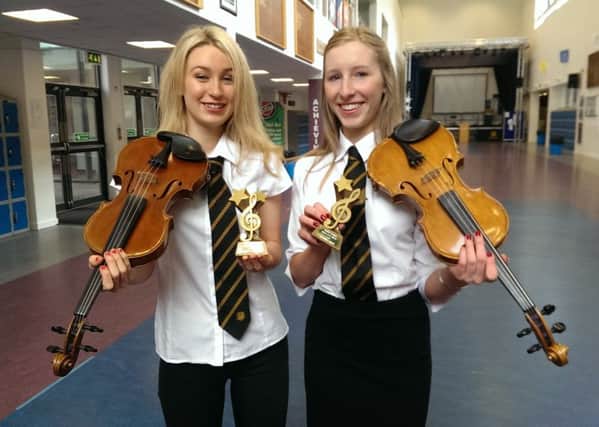 Uddingston Grammar pupils Rebecca Steven and Heather Smyth from Bothwell are joint winners of the Harry Barry Prize for Music 2017
