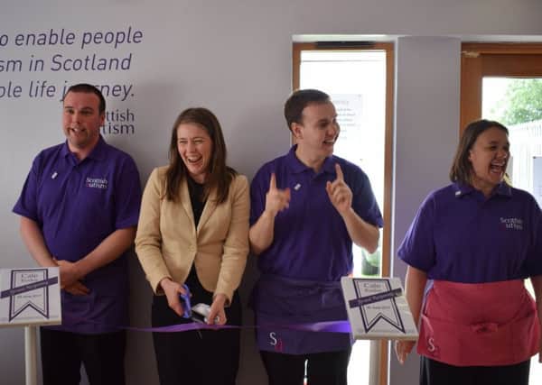 MSP Aileen Campbell, centre, at the reopening of Cafe Kudos in Carluke