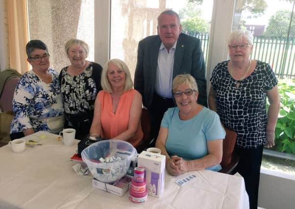 Uddingston and Bellshill MSP Richard Lyle atttends a fundraiser for  MacMillan Cancer Support at Unitas Court Sheltered Housing Complex in Mossend.