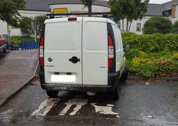 White van parked in a parent and child space at Wishaw General Hospital