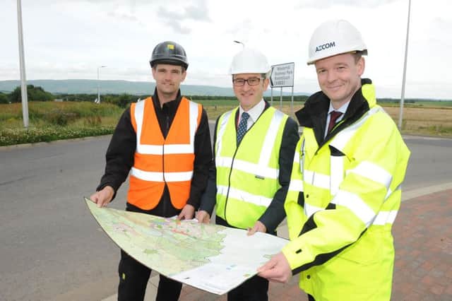 Launching the Bishopbriggs Relief Road project L/R Andrew Clark - Project Manager, Thomas Glen - EDC, Conor McCarthy - Principal Engineer, AECOM.