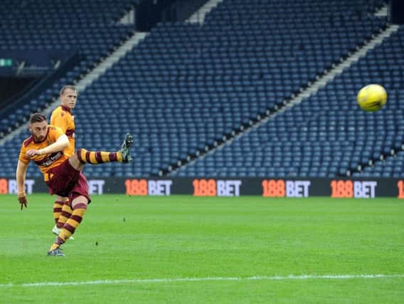 Louis Moult fires home a late free-kick in the 5-1 win at Queen's Park (Pics by Alan Watson)