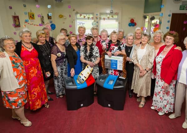 The Ladies of the Over 60's Club at the Thornton Road Community Centre with the new recycling bins.