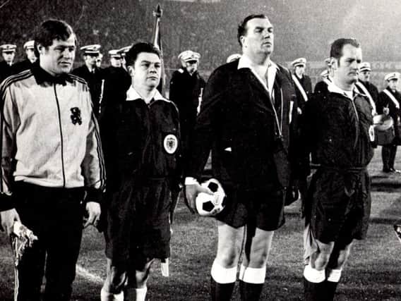George Mills (first right) was a linesman at a World Cup qualifier between Holland and Romania in Amsterdam in December 1970. The match was refereed by Tiny Wharton and the other linesman was John Dearie