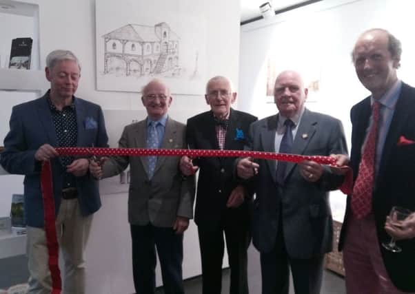 Old guard Ian Veitch, Henry Shanks and Jim OConnor cut the ribbon held by Ian Wilson Leitch (left) and Jamie Hill.
