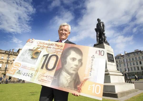David Duffy shows off the design of the Clydesdale Bank's new Â£10 note.