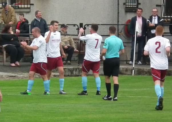 William Wells celebrates after netting for Cumbernauld in their friendly at Pollok