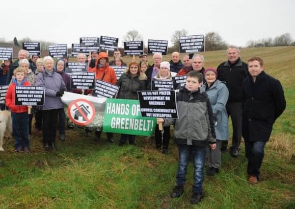 Campaigners have staged protests against the housing development
