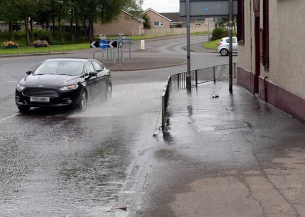 The sewage and flooding problem has resurfaced again outside the Red Lion. Pic: Alan Watson