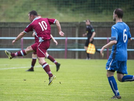 Davie Dickson blasts home Cumbernauld's second goal against Kilsyth (pic: Craig Halkett)