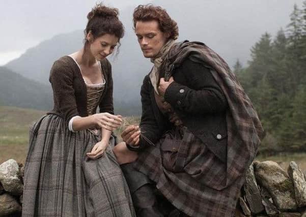 The two main stars from Outlander  Caitriona Balfe as Claire Randall and Sam Heughan as Jamie Fraser.