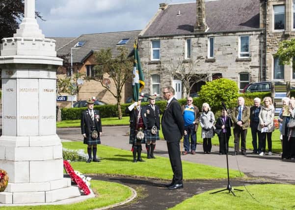 Provost Ian McAllan pays his respects at the war memorial  ( Picture Sarah Peters).
